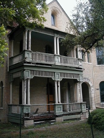 The deteriorated front porch in need of repair, 2005.