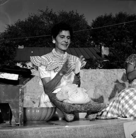 Maria Ochoa makes handmade tortillas, 1961.