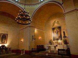 Interior of Mission Concepcion church, benath teh dome looking towards the altar.