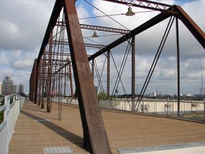 View looking east towards downtown through the trusses of the Hays Street Bridge.