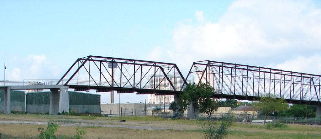 Looking southwest at the downtown skyline through the Hays Street Bridge.