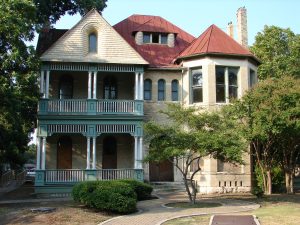 Front of the two-story Longini - Hermann House