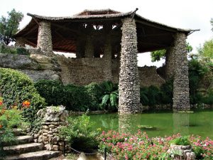 Looking towards the stone pavilion across the ornamental pond in the Japanese tea Garden.