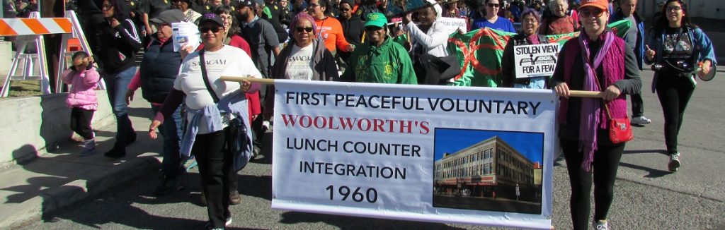 MLK Marchers carrying Woolworth banner