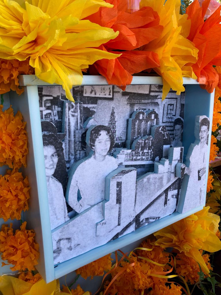 Center of the Mary Andrews ofrenda features a 3-D version of photo of her that appeared in JET magazine.