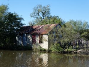 Beauregard Ranch building next to pond