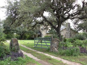 Open gate leading to Maxcimo Cadena House