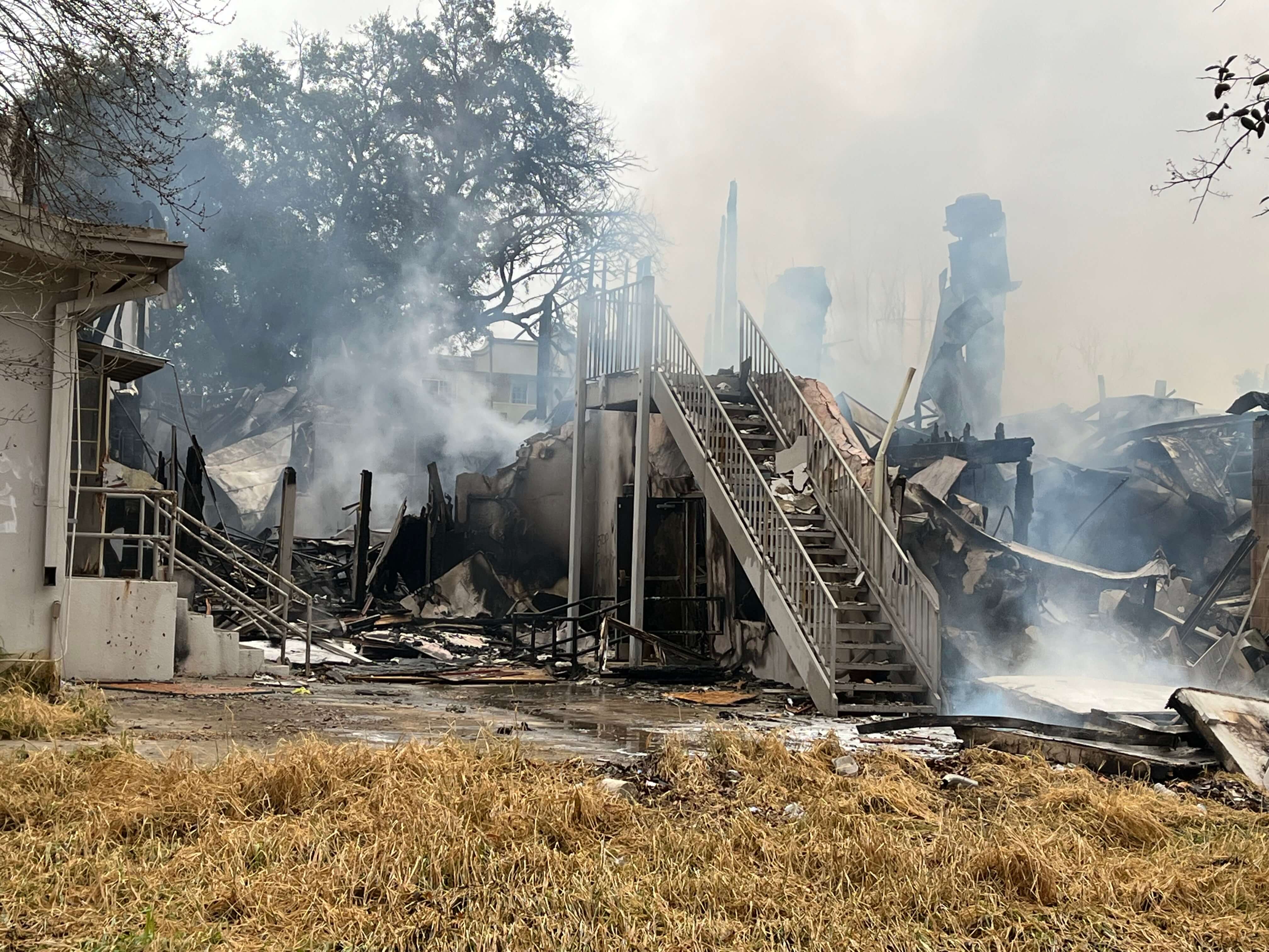 Staircase and chimney remain after fire at 503 Urban Loop