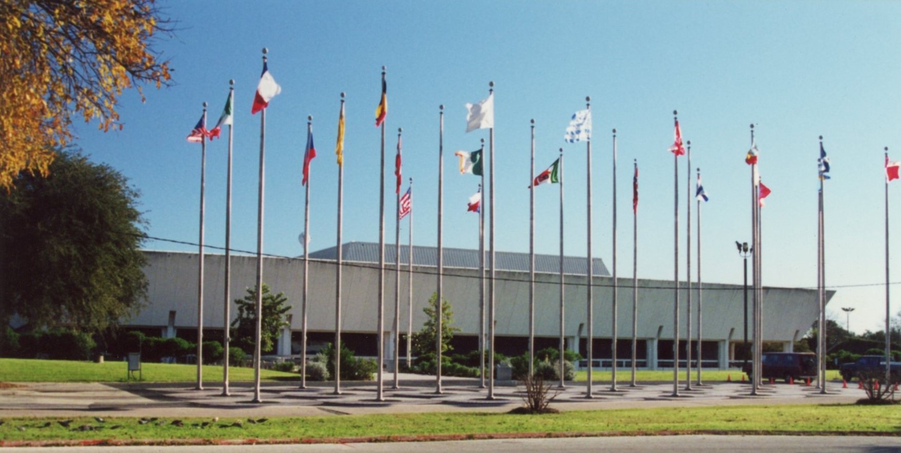 Front of Institute of Texan Cultures building with international flags flying