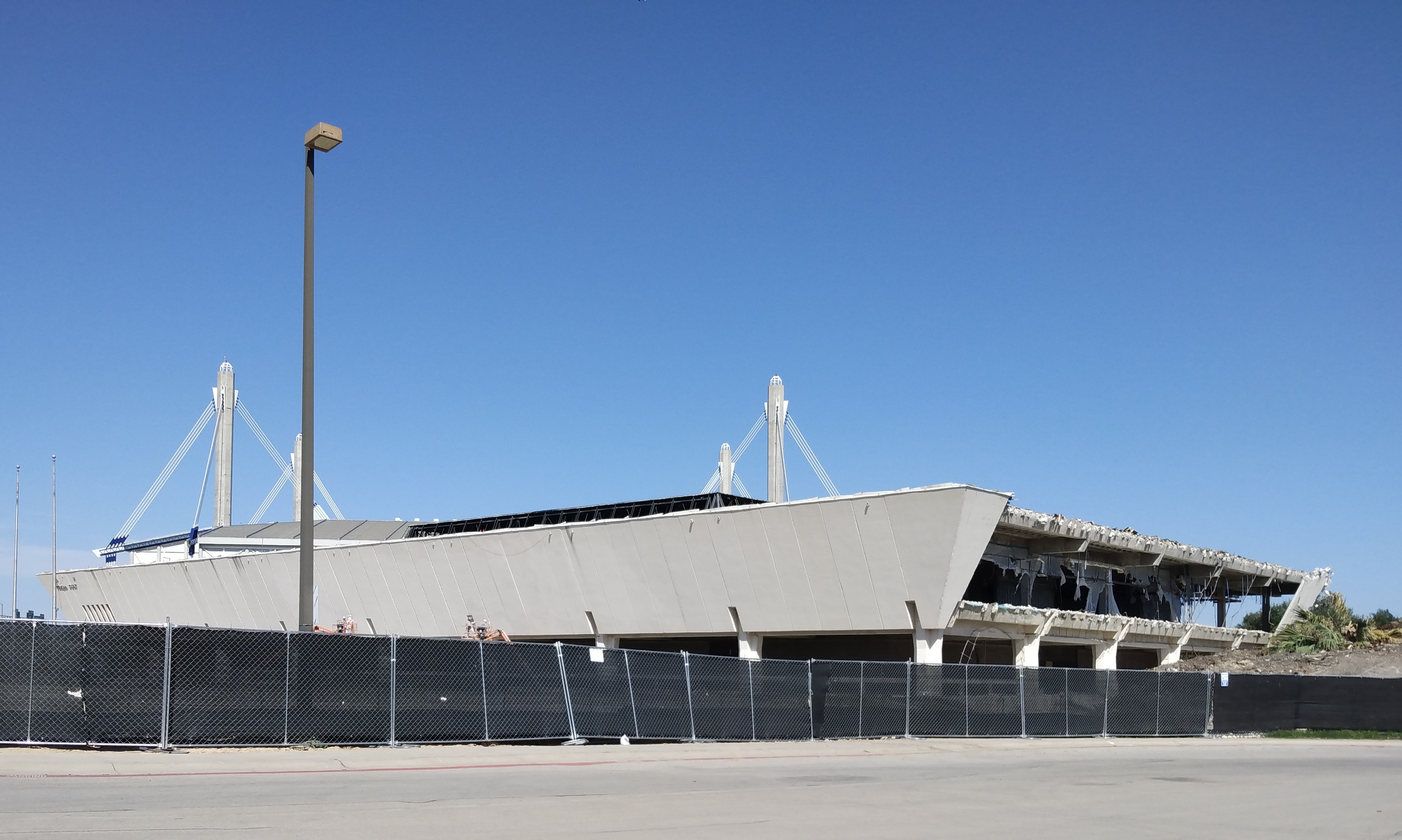 Front and Cesar Chavez facade of the Institute of Texan Cultures building showing demolition progress, May 12, 2025.